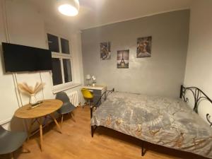 Postel nebo postele na pokoji v ubytování Magnolia Rooms Plus