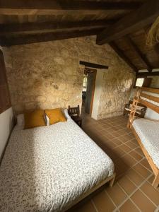 Postel nebo postele na pokoji v ubytování Casa Santierno + 16 fotografií