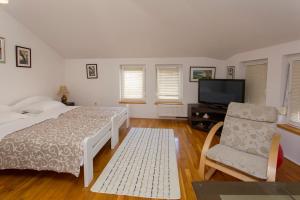 Postel nebo postele na pokoji v ubytování Guesthouse Rota