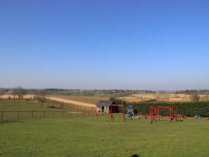 a park with a playground in a field at Apartment in Ubachsberg near Scenic Trails in Voerendaal