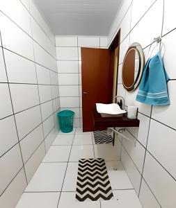 Ένα μπάνιο στο Sobrado 02 quartos próx. Recanto Cataratas Thermas Resort & Convention