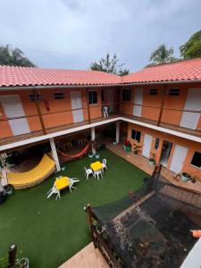 an aerial view of a building with a playground at Village enseada do castelo-com carregador de carros eletricos in Praia do Forte