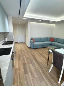 Posezení v ubytování Mona Seaside Apartment with Parking