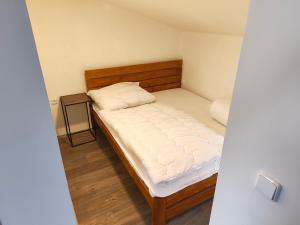 Postel nebo postele na pokoji v ubytování Penzion - sklipek Otáhalovo