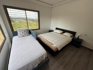 Un ou plusieurs lits dans un hébergement de l'établissement Zs Farm Kamouni - WIFI Fibre - Jacuzzi on request