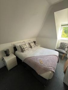 Voodi või voodid majutusasutuse Glenroy Guest House toas