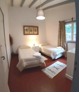 Postel nebo postele na pokoji v ubytování El Espinillo 2 - Paz y Tranquilidad garantizada