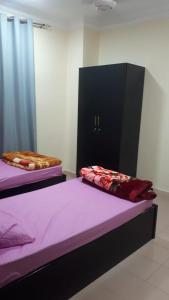 Postelja oz. postelje v sobi nastanitve madam hostel 2