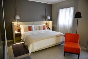 Letto o letti in una camera di Clarion Faria Lima