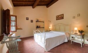 Posteľ alebo postele v izbe v ubytovaní Agriturismo Le Buche di Viesca