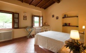 Posteľ alebo postele v izbe v ubytovaní Agriturismo Le Buche di Viesca
