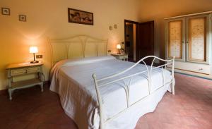 Posteľ alebo postele v izbe v ubytovaní Agriturismo Le Buche di Viesca