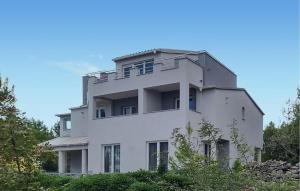 a white house on top of a hill at Awesome Apartment In Pridraga With Wifi in Pridraga