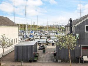 a marina with a bunch of boats in the water at 5 star holiday home in Køge in Køge