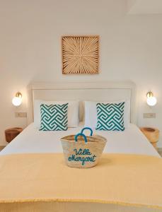 Postel nebo postele na pokoji v ubytování VILLA MARGARIT Boutique Hotel