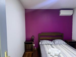Una cama o camas en una habitación de Gîte des Flamboyants Orion Pk 14