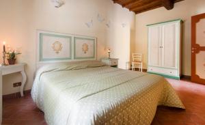 Posteľ alebo postele v izbe v ubytovaní Agriturismo Le Buche di Viesca