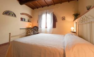 Posteľ alebo postele v izbe v ubytovaní Agriturismo Le Buche di Viesca