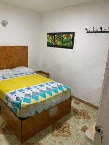 Postel nebo postele na pokoji v ubytování HOTEL DEl PARQUE