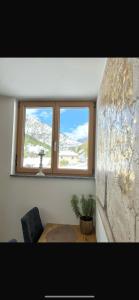Nespecifikovaný výhled na hory nebo výhled na hory při pohledu z apartmánu