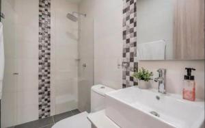 Un baño de Apartamento torre canelo 11 fotos más