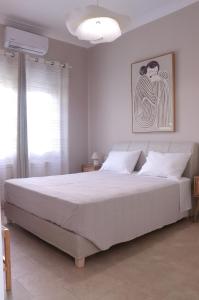 Postel nebo postele na pokoji v ubytování Urban Retreat 72