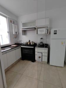 Køkken eller tekøkken på Departamento en Torres Ventura