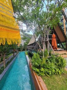 Bazén v ubytování Escent ville Chiang Mai F3B2 nebo v jeho okolí