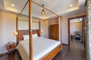 Postel nebo postele na pokoji v ubytování Guava Hill Boutique Hotel