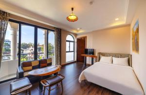 Postel nebo postele na pokoji v ubytování Guava Hill Boutique Hotel