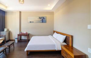Postel nebo postele na pokoji v ubytování Guava Hill Boutique Hotel