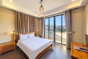 Postel nebo postele na pokoji v ubytování Guava Hill Boutique Hotel