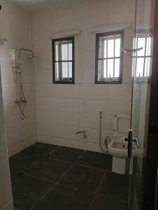 Phòng tắm tại Lamaisu Homes Block 3