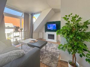 Μια τηλεόραση ή/και κέντρο ψυχαγωγίας στο Modern Apartment in City Center