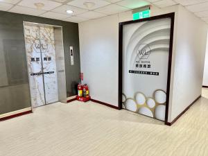 a room with two doors with a bunch of eggs at WL HOTEL Hsinchu in Hsinchu City +32 photos