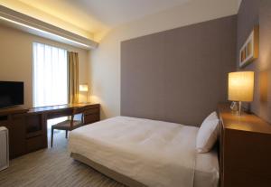 TV a/nebo společenská místnost v ubytování Odakyu Hotel Century Sagami Ono