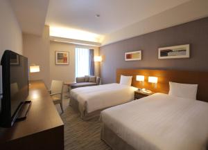 TV a/nebo společenská místnost v ubytování Odakyu Hotel Century Sagami Ono