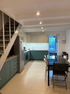 Kuchyň nebo kuchyňský kout v ubytování Maison a la plage