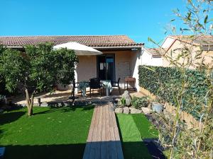 Κήπος έξω από το Villa de luxe en bord de mer Résidence Torra Mare a Prunete