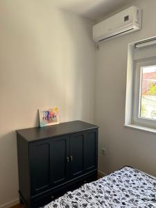 Posteľ alebo postele v izbe v ubytovaní Apartments Madzari - Ciovo - Pool