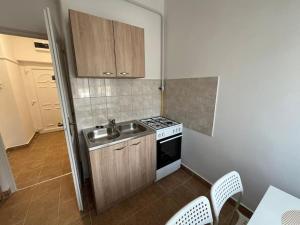 Dapur atau dapur kecil di Lombkorona apartman