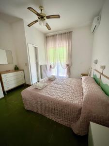 Postel nebo postele na pokoji v ubytování Bed&Breakfast Villa Lorena