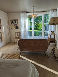 Postel nebo postele na pokoji v ubytování Manoir de L'Echauguette