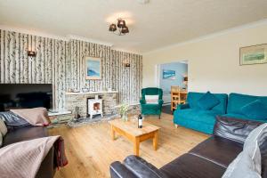 Posezení v ubytování Pine Lodge