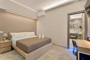 Letto o letti in una camera di Toc Toc