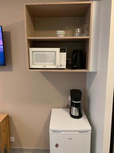 Η κουζίνα ή μικρή κουζίνα στο Grande chambre-appartement Sara