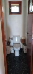a bathroom with a white toilet and a window at Villa Maison de campagne 04 Vacheres Luberon 3 chambres 8 personnes in Vachères