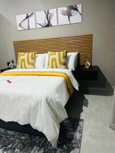Katil atau katil-katil dalam bilik di Impèrio Boutique Guest Lodge +8 gambar