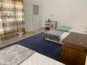 Giường trong phòng chung tại Gisa Hostel All Private Ensuite Rooms
