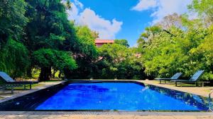 Bazén v ubytování Foresta Resort Sigiriya nebo v jeho okolí